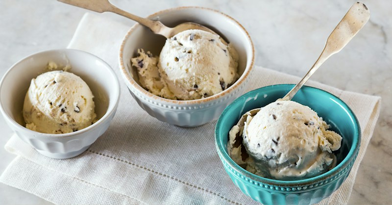 Scoops of creamy white gelato in a ceramic bowl