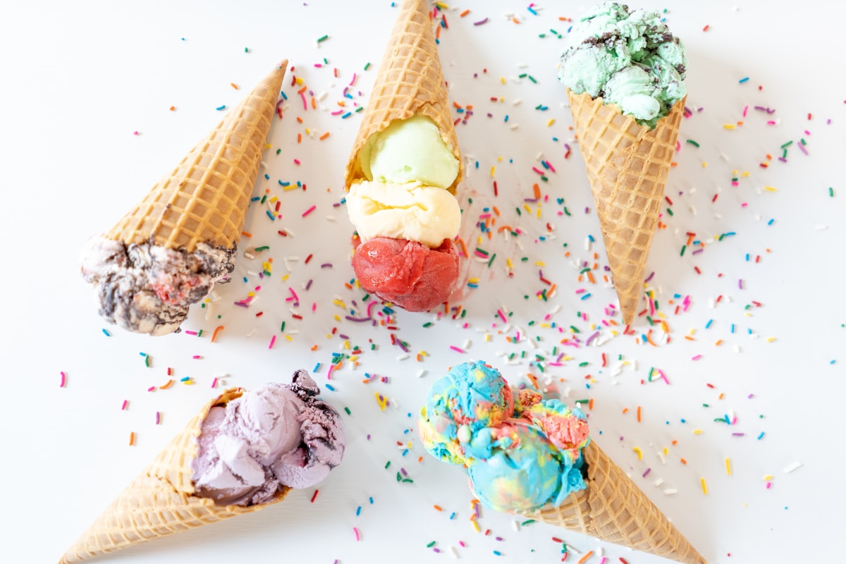 Ice cream cone topped with sprinkles