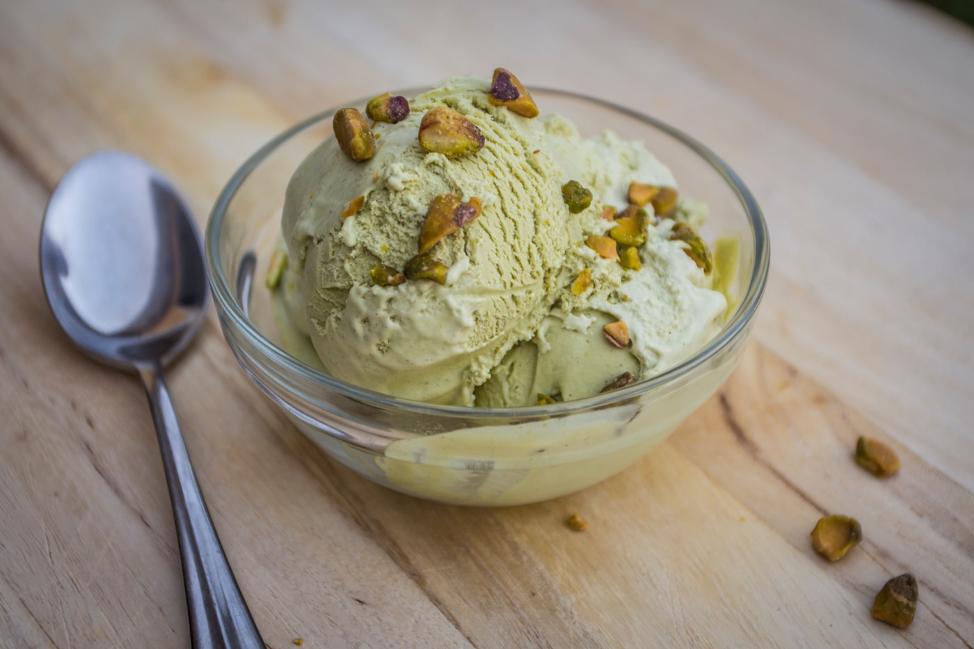 A cup of gelato with a spoon